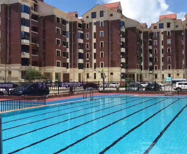 宝安西乡黄田30栋花园房《兴达花园》自带游泳池 70年产权 1：1停车位